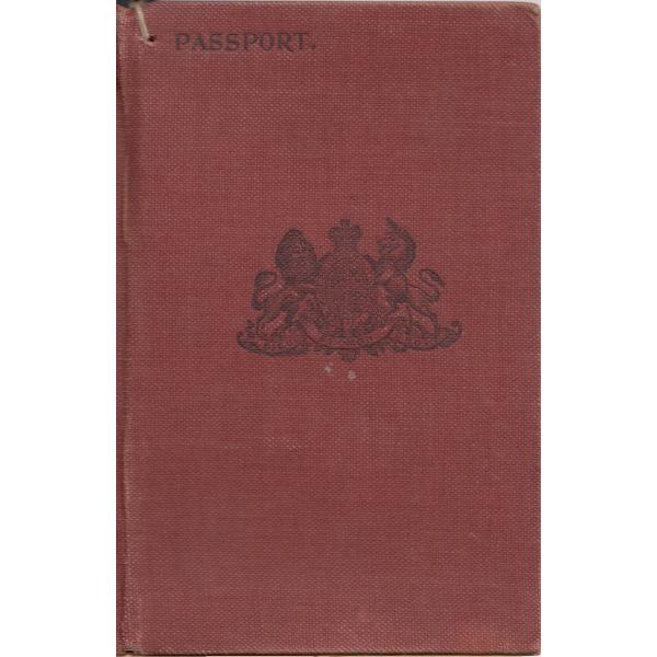 Front of the passport issued in Singapore with a red cover and coat of arms of the United Kingdom. 