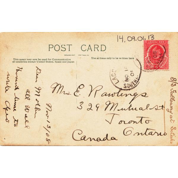 The back of a postcard addressed to Mrs. Rawlings. It is yellow with black writing. There is a red stamp from Southern Nigeria as well as a postmark. 