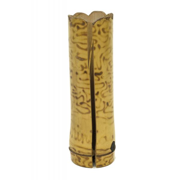 The back view of one vase that shows a crack that runs from the top to the bottom. The vase is yellow in colour and a swirl pattern was burned into the bamboo.