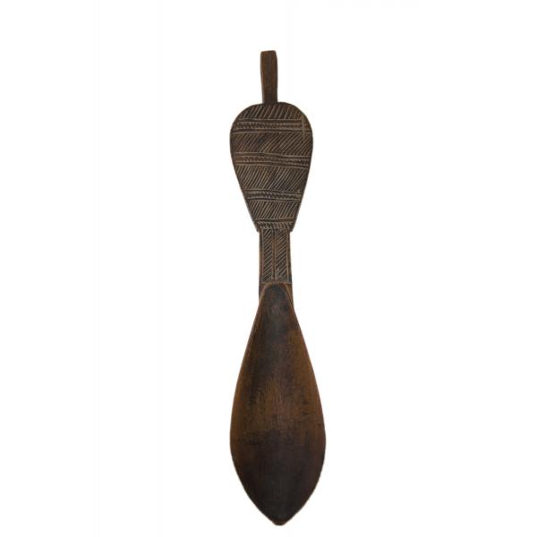 The front of a carved wooden spoon. The spoon is smooth while the handle has nine alternating rows of diagonal stripes and diamonds. There is a stem at the top of the handle. 