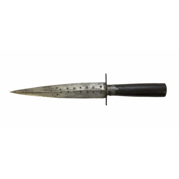 A metal dagger, pointing to the left. It has a dark wood handle. The blade is symmetrical and there are two rows of dots down its length.