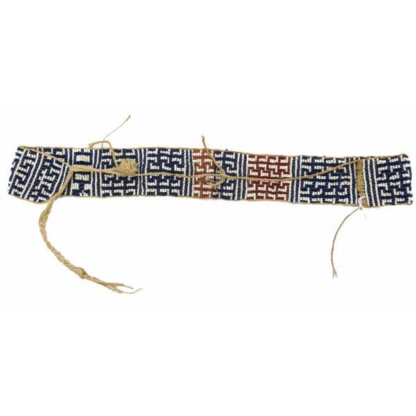 White, blue, and red beads woven into a geometric design, forming a rectangle. A piece of braided twine runs over top of the beads.