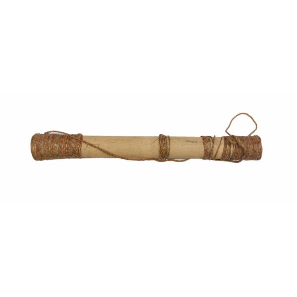 A light brown quiver made from bamboo. It is long and cylindrical. It has brown hemp wrapped around both ends that forms a strap. 