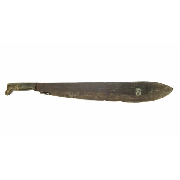 A metal machete with a long, curving blade and a bone handle with a dark wooden base, pointing to the left. There is a small image of a sun on the blade right next to the handle.