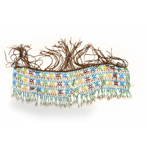 A colourful beaded necklace with leather fringe and hanging cowrie shells. The beads are blue, green, yellow, and red. 