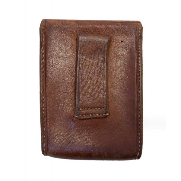 The back of a brown-leather pouch showing a belt loop. There is light brown stitching holding the pouch together.