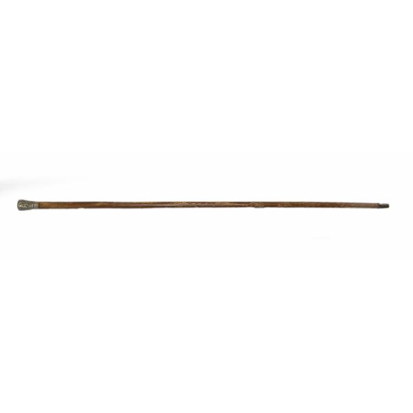 Walking cane of maple-coloured malacca wood and a brass handle