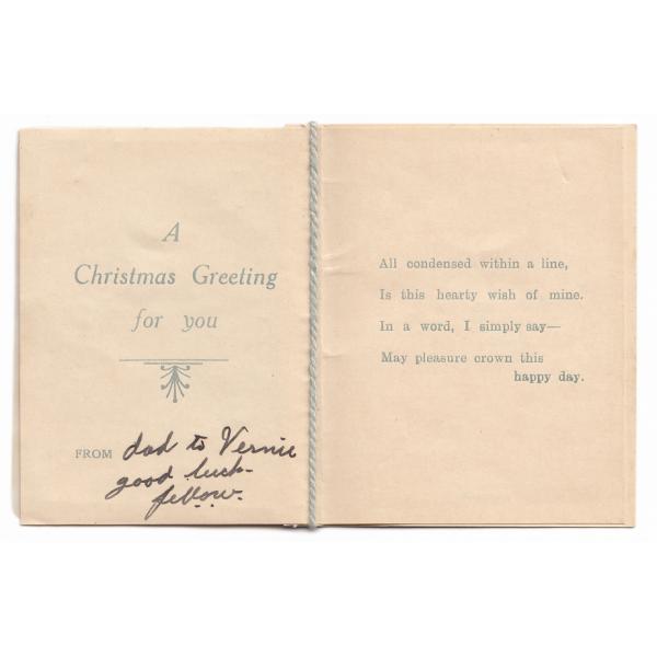 The inside of a Christmas card. It says: "A Christmas Greeting for you. All condensed within a line, Is this hearty wish of mine, In a word, I simply say - May pleasure crown this happy day."