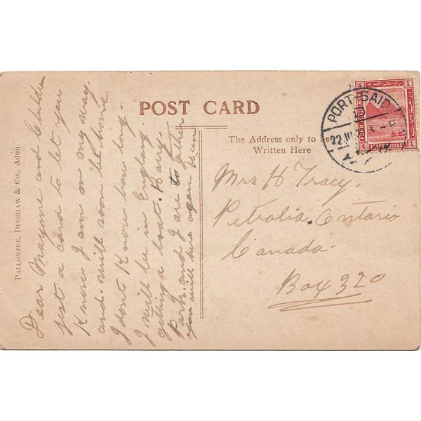 The back of a handwritten postcard addressed to Mrs. Tracy and with an Egyptian stamp as well as a postmark from Port Said. 