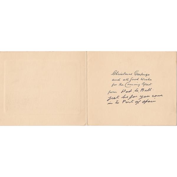 The inside of a Christmas card with a handwritten note from Mr. Tracy. The note was written in black ink. 