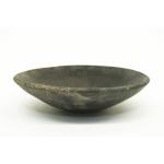 A shallow black bowl with a wide opening. 