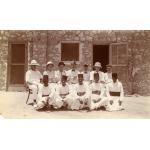 Photograph of six oil drillers in Egypt with five members of the serving staff