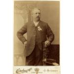 Portrait photograph of Matthew Porter in a suit. "Creelman & Co, Sydney Arcade, Sydney" is printed along the bottom.