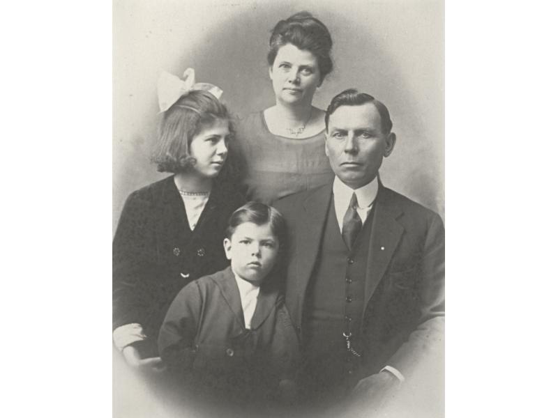 Family portrait of Charles E. Wallen, his wife, daughter, and son.