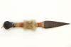 Front view of the toy wooden knife with orange, green and natural coloured hemp decoration.