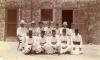 Photograph of six oil drillers in Egypt with five members of the serving staff