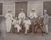 Group of oil drillers in Burma, outside their quarters